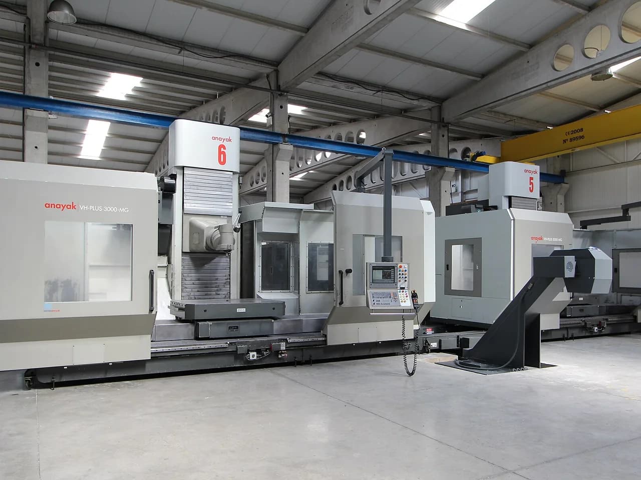 A line of CNC machining centres in a factory hall