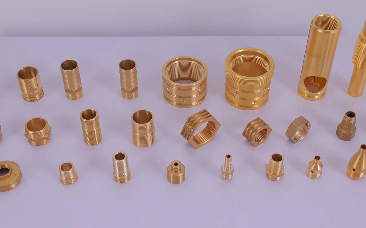 Brass hose nipples, hex nipples, reducing bushes, threaded couplings and nozzle tips