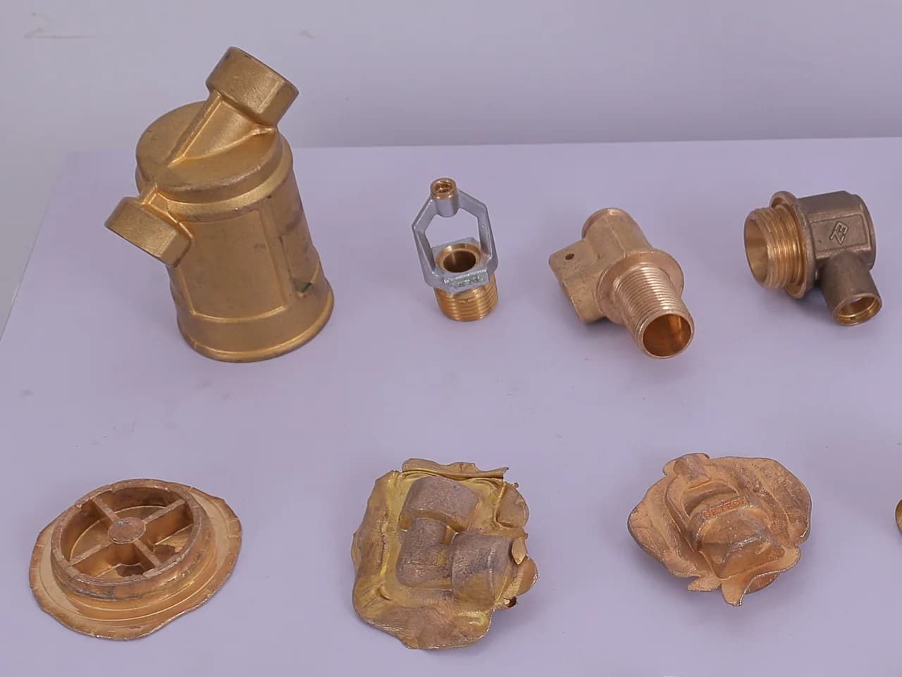 Close-up of hot-forged brass blanks before machining