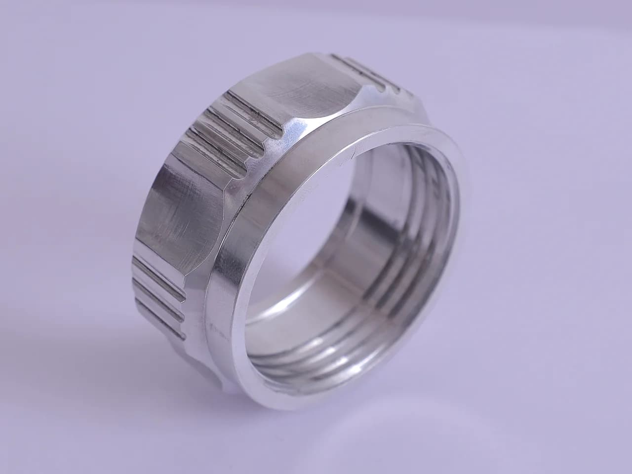 Machined threaded lock ring with milled grip slots