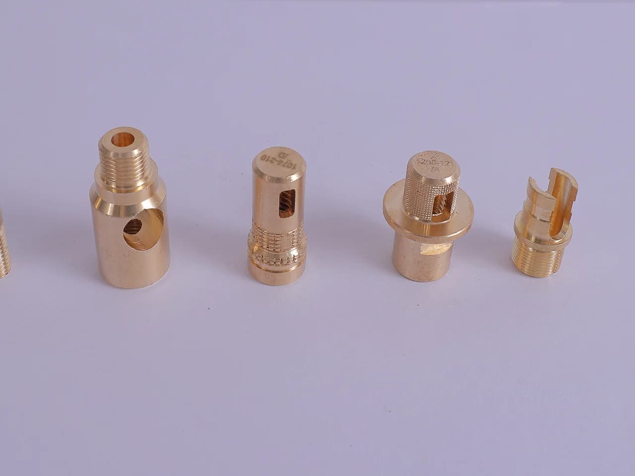 Brass sprayer nozzle bodies with side ports, windowed swirl sleeves and threaded stems
